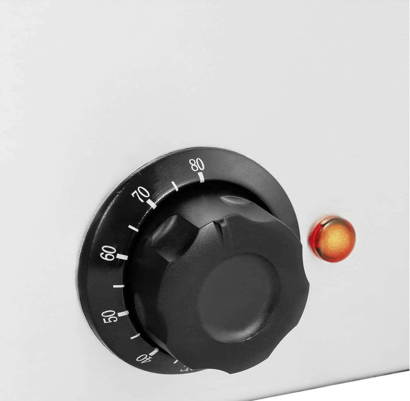 Een temperatuurregelaar met een schaal van 60 tot 80 graden en een draaiknop naast een rond controlelampje.