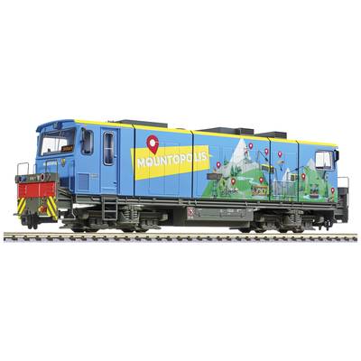 Een modeltreinstel in blauw-gele kleuren met het opschrift 'Mountopolis'. Aan de zijkant zijn bergmotieven en rode markeringen afgebeeld.