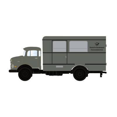 Een historische Duitse Bundespost-telecommunicatievrachtwagen van opzij gezien. Donkere laklaag met opschrift en logo zichtbaar.