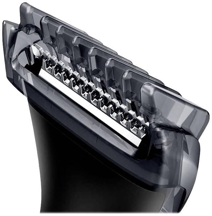 Close-up van een elektrische scheerkop met messen en beschermkap. Ideaal voor precisie bij het scheren van gezicht en lichaam.