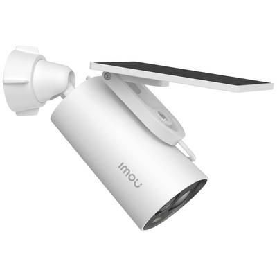 De opname toont een witte beveiligingscamera met zonnepaneel. De camera is bevestigd aan een wandsteun en geschikt voor buitenbewaking.