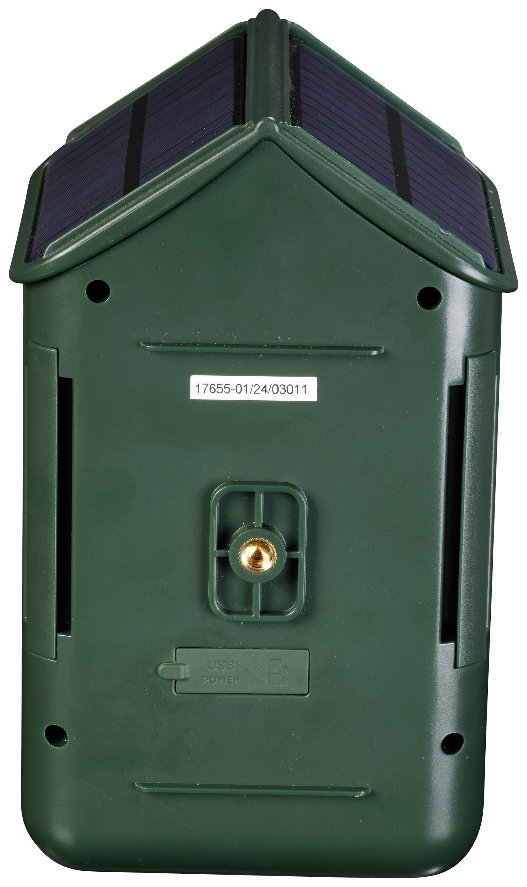 Een groen, rechthoekig apparaat met zonnepanelen bovenop en een gat aan de voorkant, waarschijnlijk geschikt voor wandmontage.