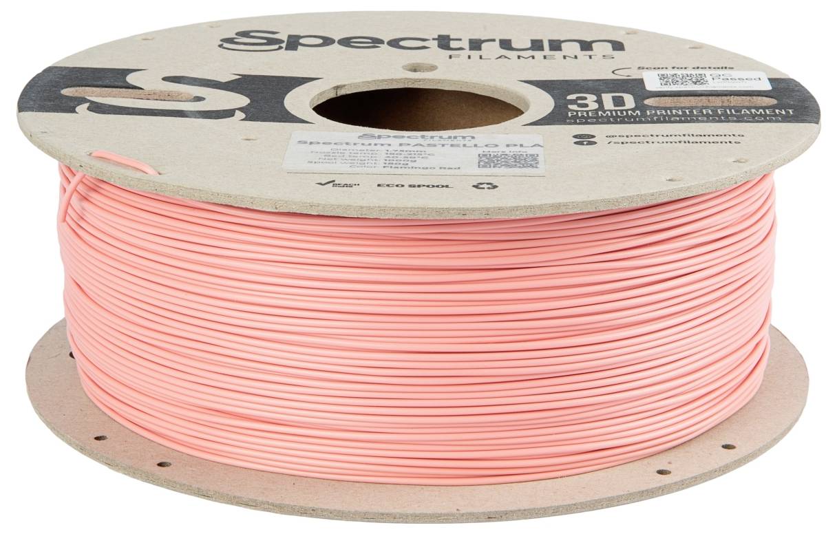 Een rol roze 3D-printerfilament van het merk Spectrum, met etiket op de bovenkant.