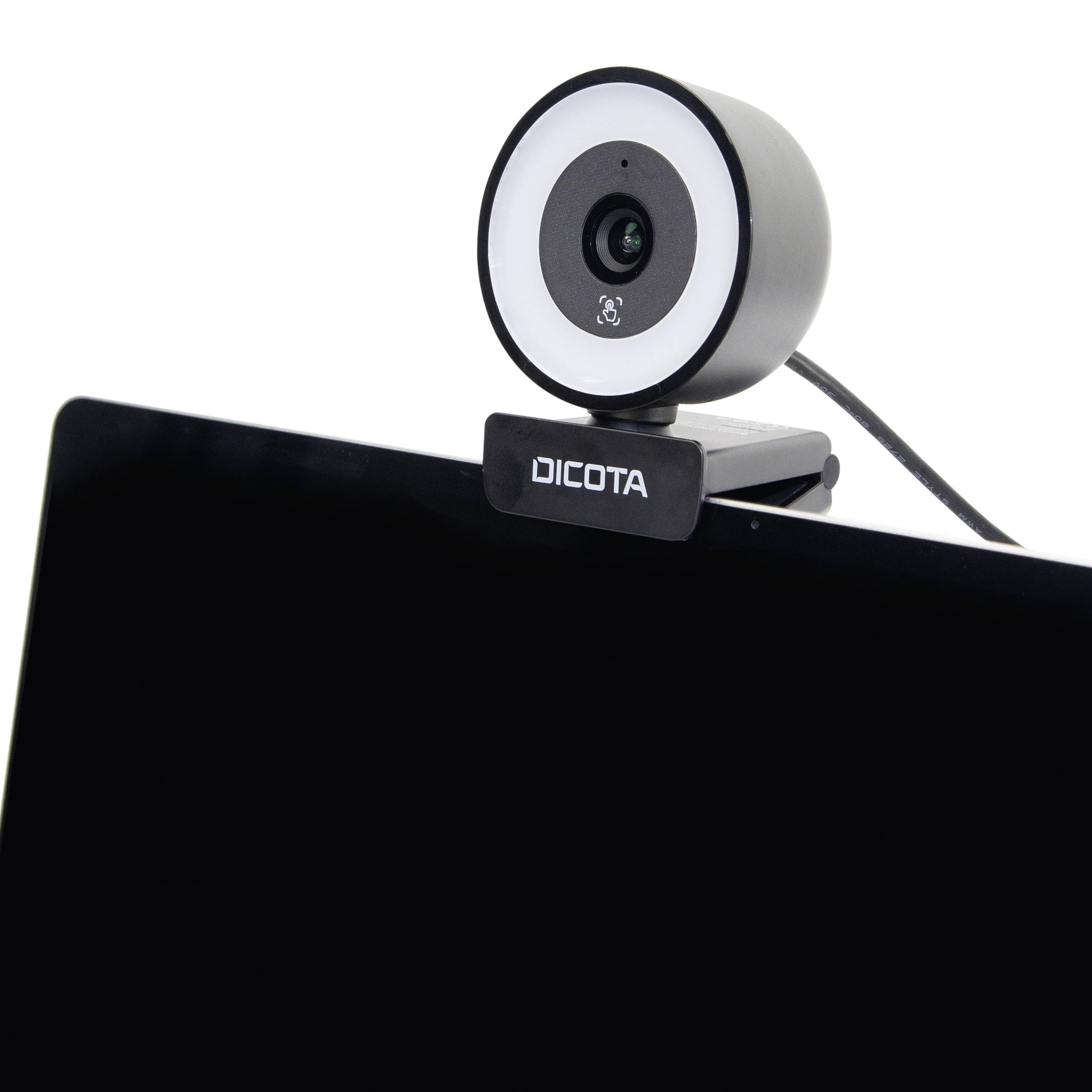 Een webcam met geïntegreerde microfoon zit bovenaan een computermonitor. De webcam heeft een witte LED-ring rond de lens.