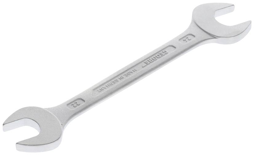 Een zilveren steeksleutel met twee maten van 22 mm en 24 mm, liggend op een lichte achtergrond. Toebehoren voor mechanische werkzaamheden.