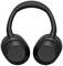 Zwarte, draadloze over-ear koptelefoon met afgeronde oorschelpen en een gewatteerde hoofdband, geschikt voor muziekplezier onderweg.