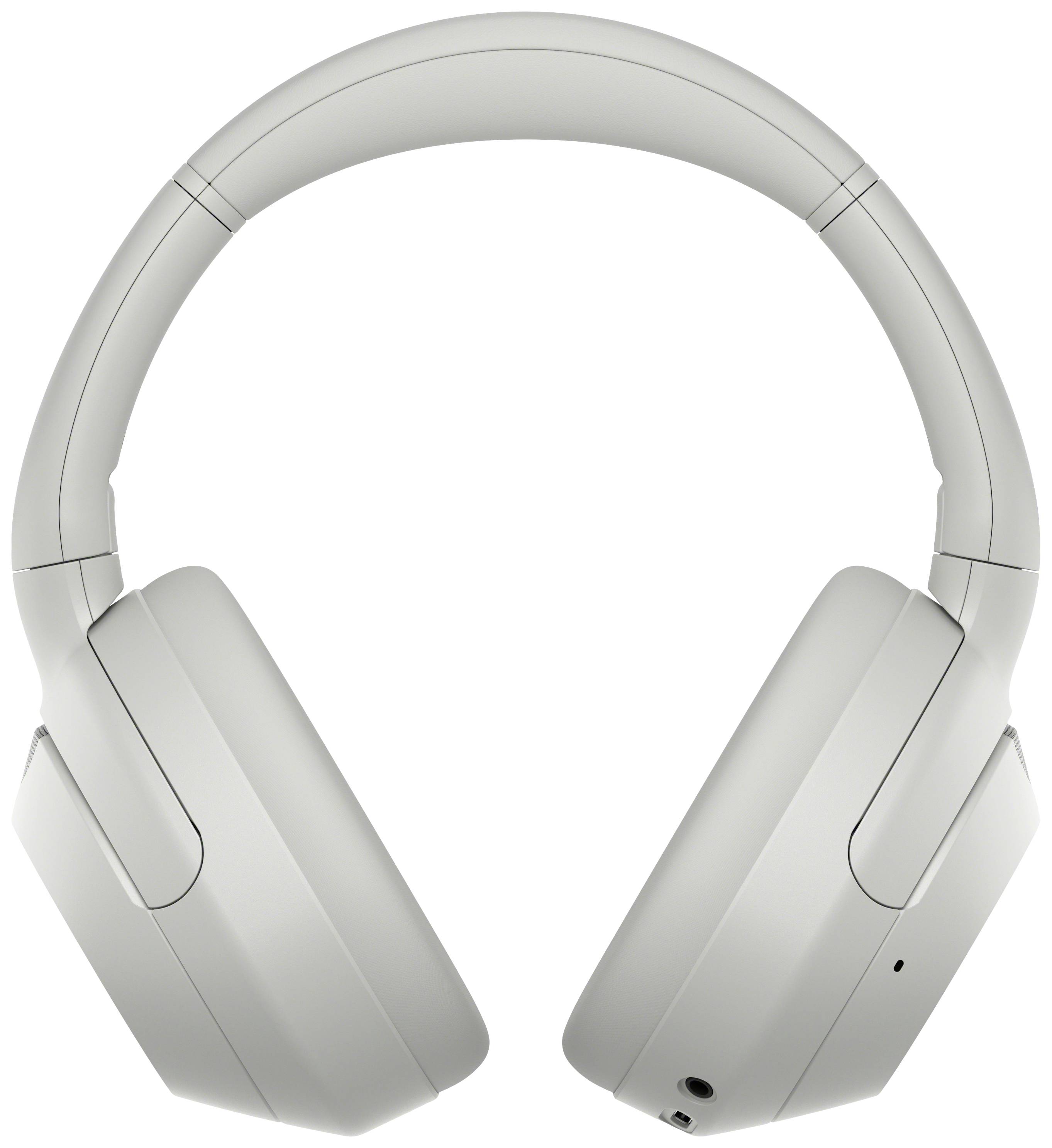Draadloze, over-ear koptelefoon in grijs, ergonomisch ontworpen, met geïntegreerde bedieningselementen en audio-aansluiting onderaan.