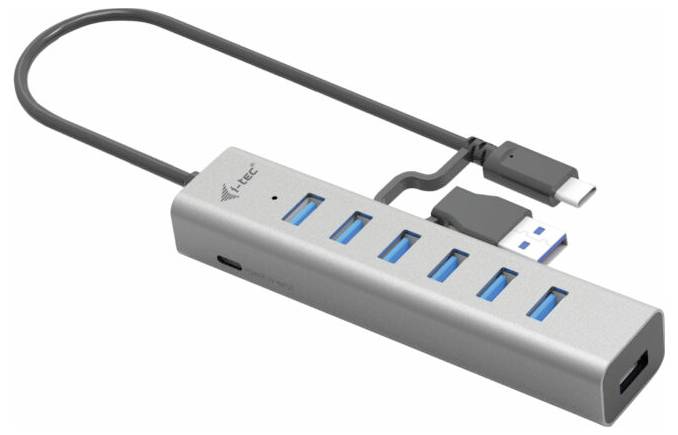 Een USB-hub met zeven aansluitingen, waaronder USB 3.0 en USB-C, verbonden door een kabel. Zilveren behuizing op een witte achtergrond.