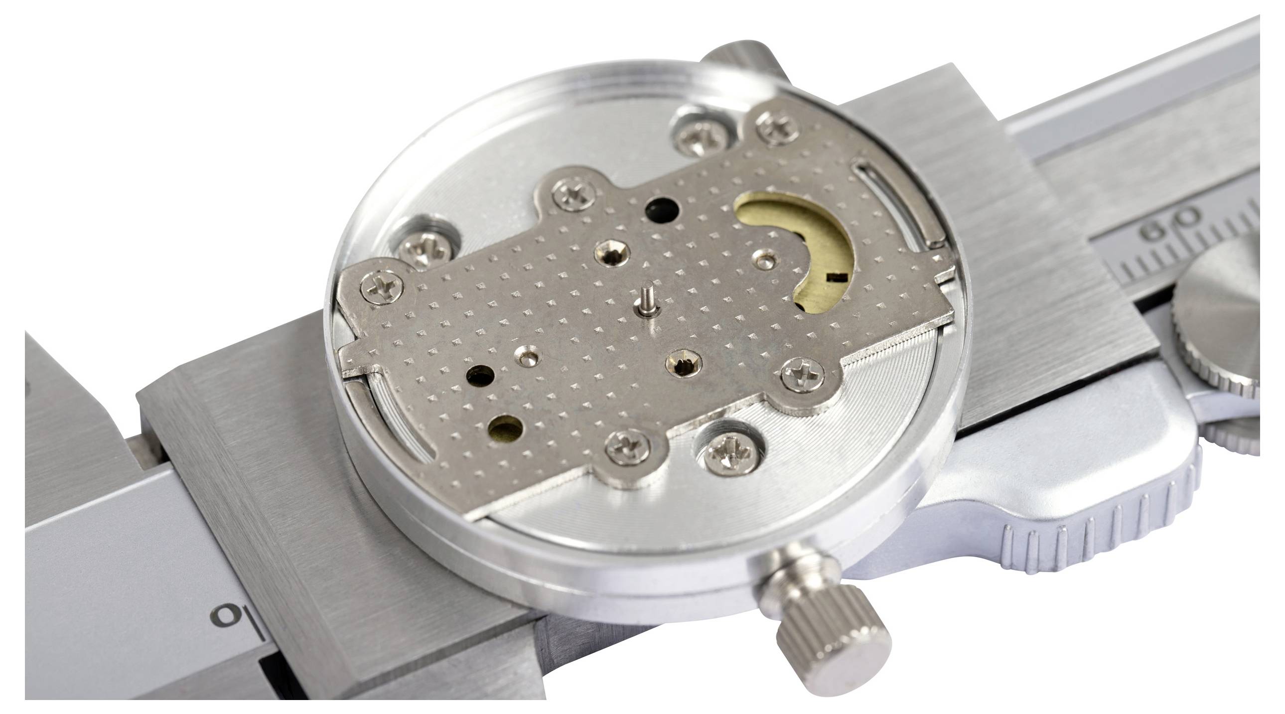 Close-up van een precisie-meetinstrument met schaal en stelschroef, dat wordt gebruikt voor nauwkeurige metingen in technische toepassingen.