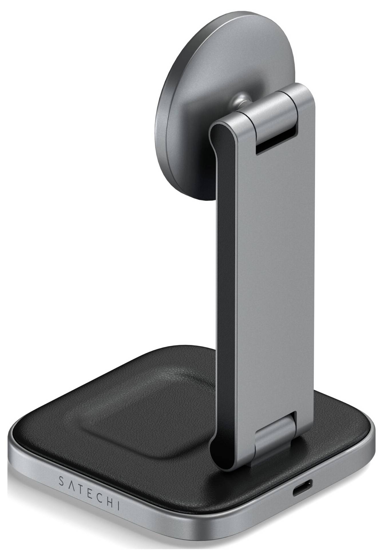Een grijze, opvouwbare telefoonhouder van Satechi met oplaadaansluiting, geplaatst op een zwarte standaard. Ideaal voor bureaus.