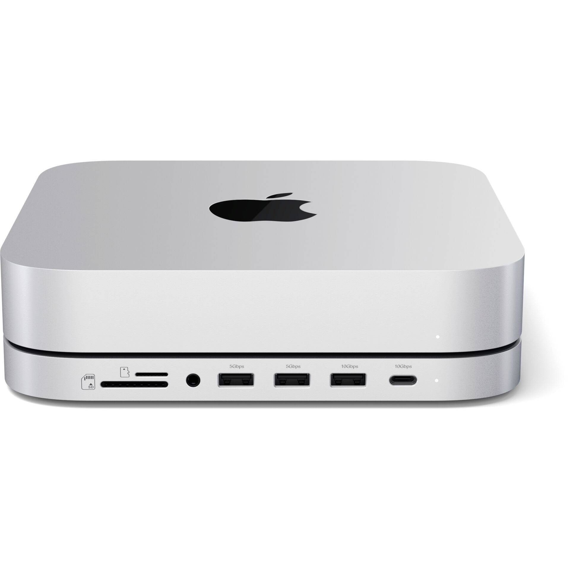 Een zilveren mini-computer met het logo van een bekende technologieonderneming. Aan de achterkant zijn verschillende aansluitingen zichtbaar.