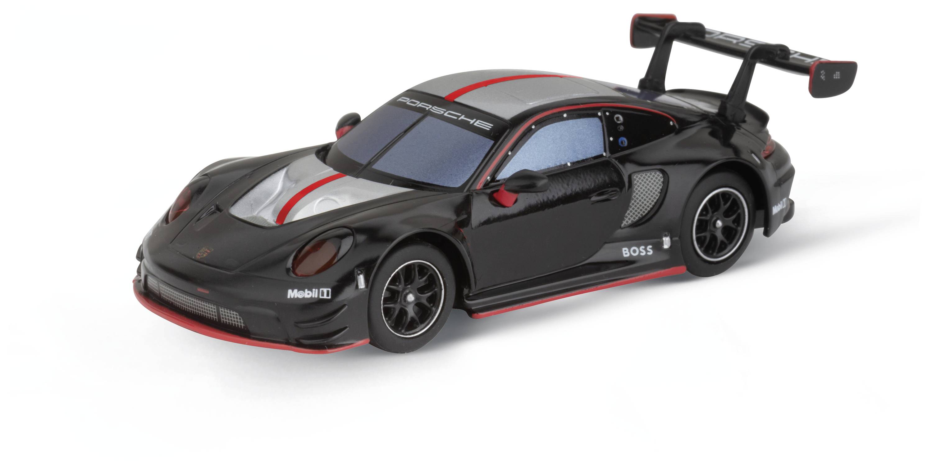 Een zwarte modelauto van een sportwagen met rode accenten en een grote achterspoiler, gepresenteerd op een witte ondergrond.