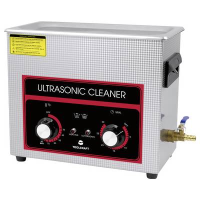 Ultrasoonreiniger met twee draaiknoppen voor temperatuur en timer, kraan aan de zijkant voor het aftappen van de vloeistof.