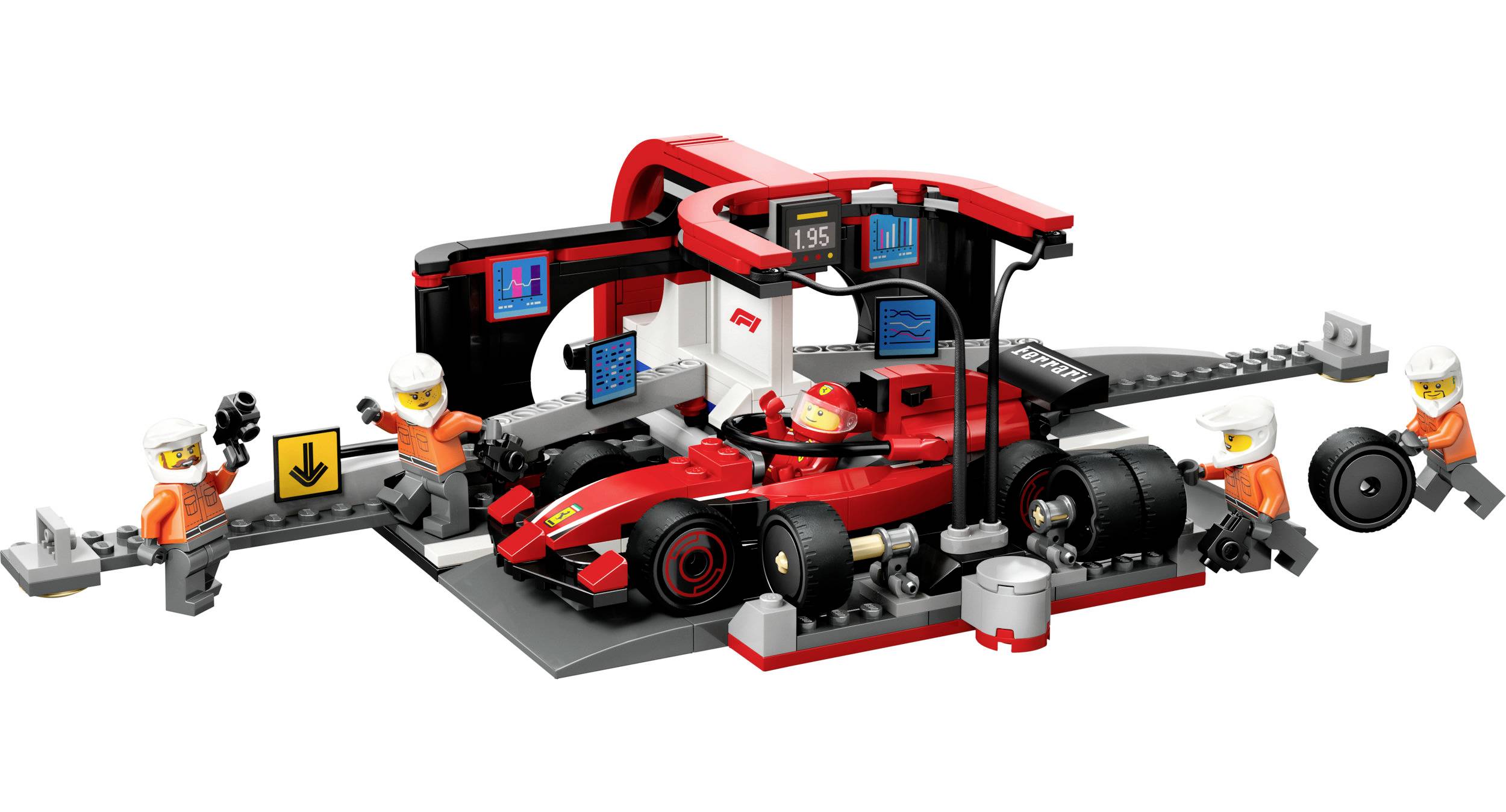 Een Lego-raceauto-pitstraat-scène met figuren in oranje overalls. De raceauto wordt onderhouden, banden worden gewisseld.