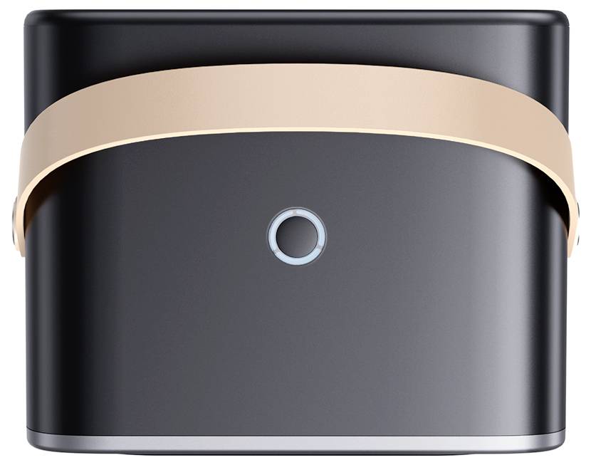 Een vierkaartig, zwart apparaat met een centrale, lichtgevende knop en een breed, beige-gouden band aan de bovenkant.