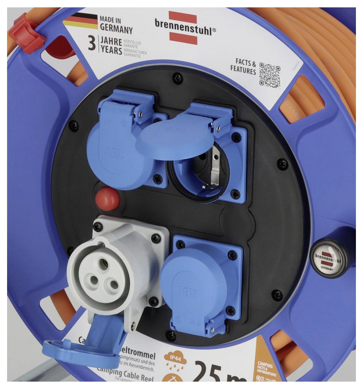 'Kabelhaspel met meerdere blauwe stopcontacten en een zwart snoer. Geproduceerd in Duitsland, 25 m bereik, 3 jaar garantie.'