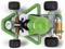 Een groene speelgoed-kart met een bestuurder in een groen outfit, gezien van bovenaf. De kart heeft vier wielen en een uitlaat aan de rechterkant.