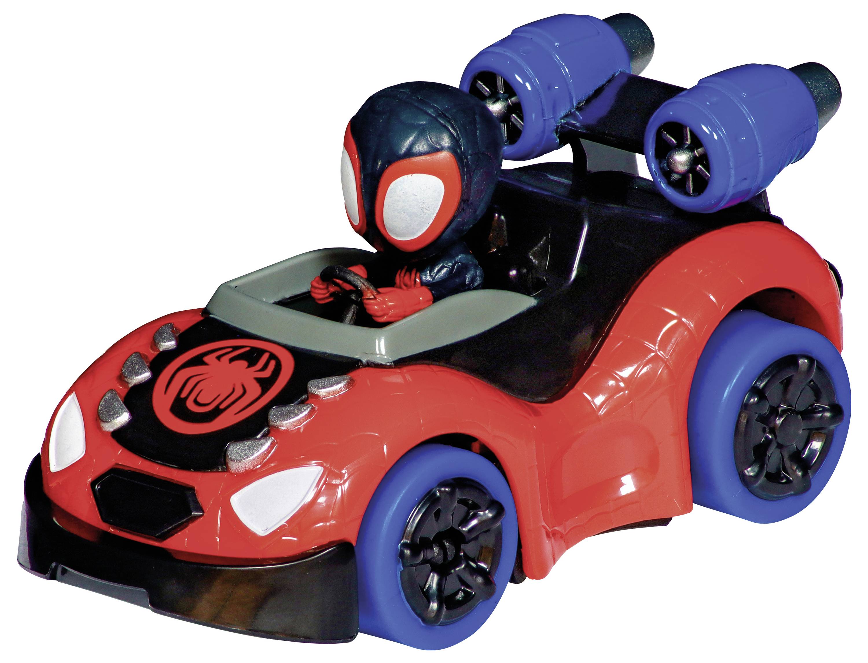 Een rood speelgoedautootje met blauwe wielen. Daarin zit een figuur in een zwart pak met grote witte ogen. Op de motorkap staat een spinnensymbool.
