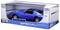 Blauwe modelauto van een Pontiac Firebird Trans Am uit 1979 in een verpakking met de tekst 'Special Edition'.