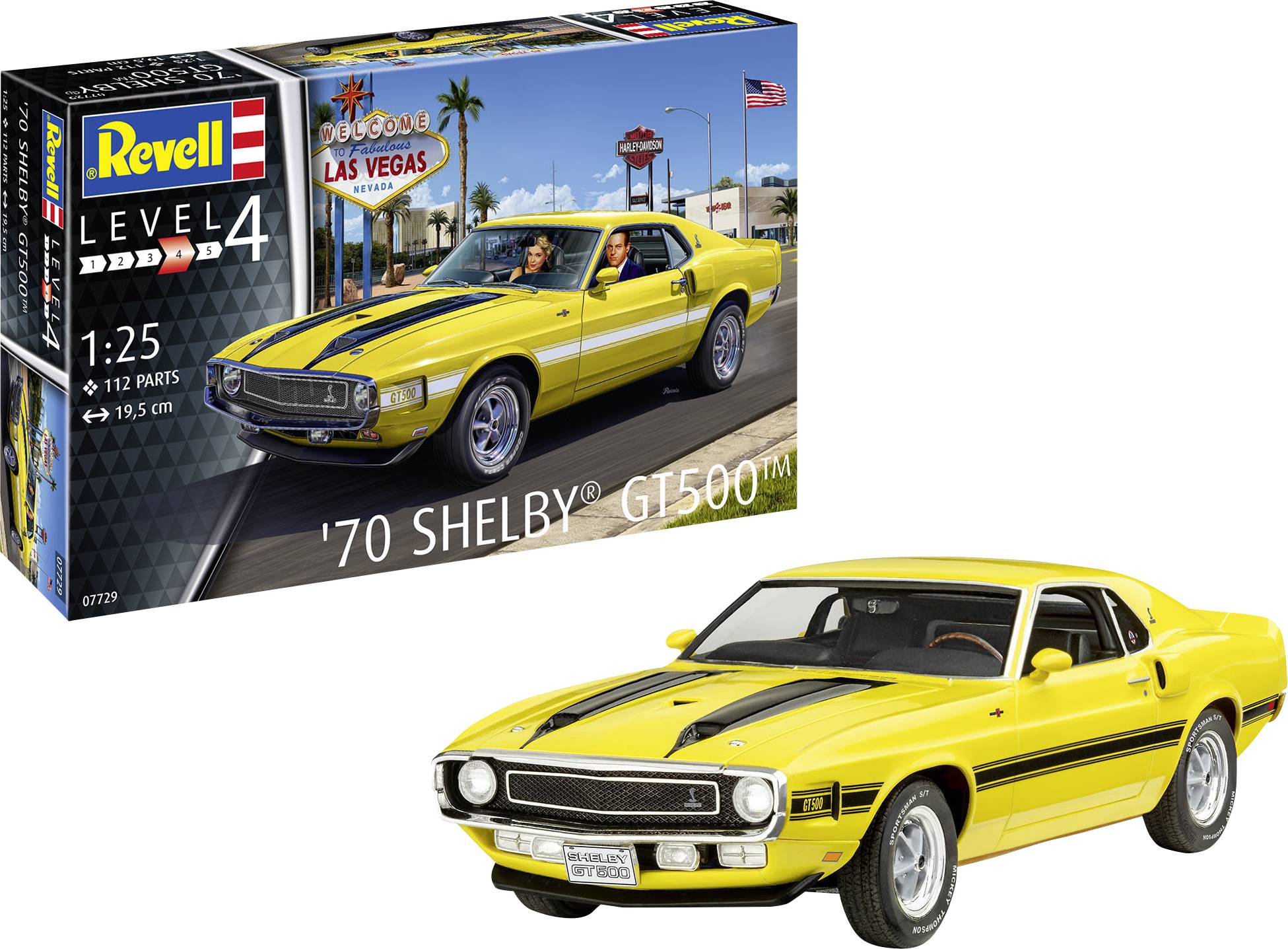 Modelbouwpakket van een gele '70 Shelby® GT500™ met zwarte strepen. Verpakking toont auto in een straatscène in Las Vegas.