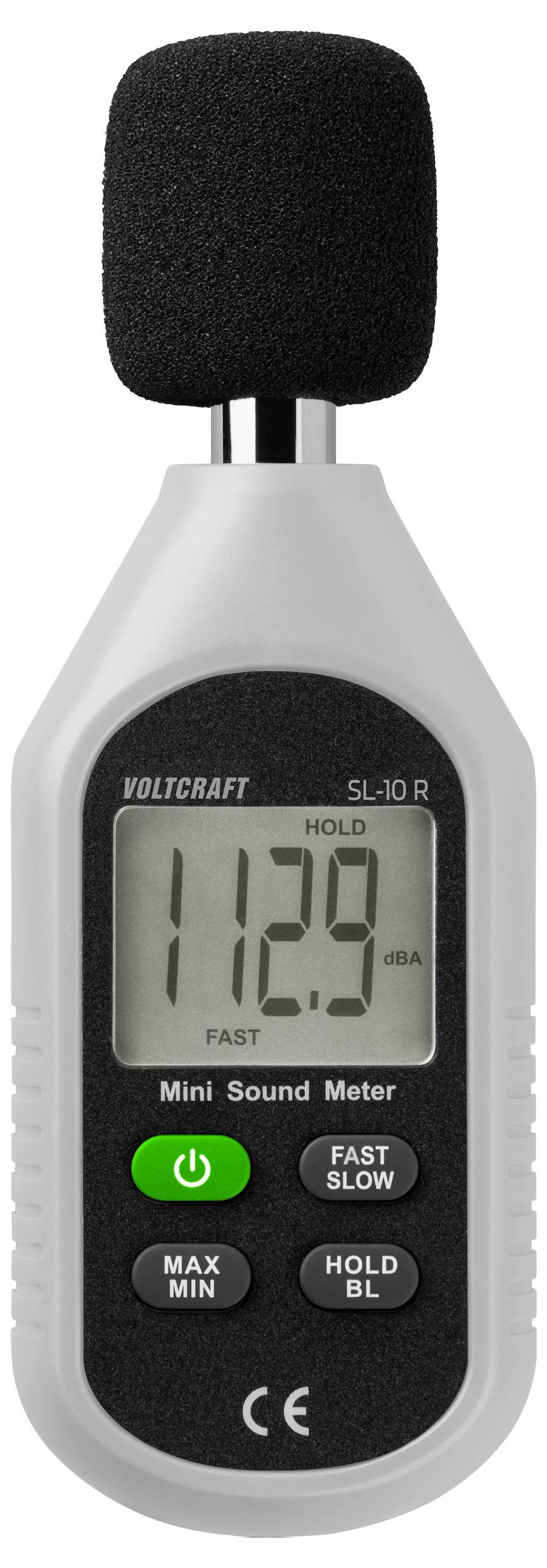 Geluidsniveaumeter met een aanduiding van 112,9 decibel. Zwarte microfoonafdekking bovenaan, groene aan/uit-knop onderaan.
