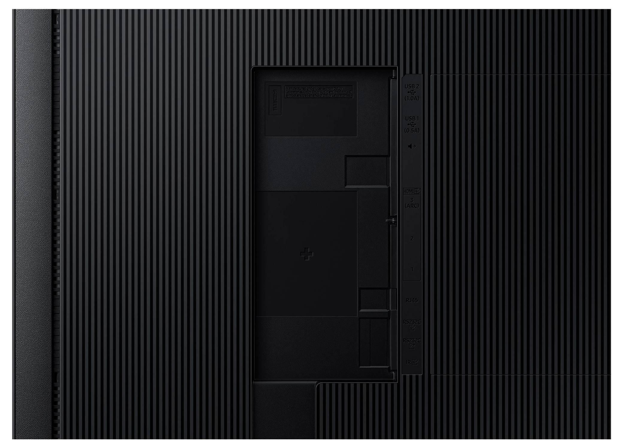 Achteraanzicht van een televisietoestel met een gestructureerde zwarte behuizing en zichtbare aansluitafdekking, geen tekst of logo's zichtbaar.