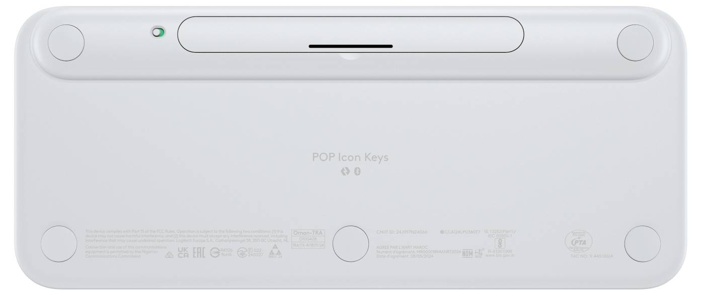Witte draadloze toetsenbord achteraanzicht met Pop-icoon-toetsen, aan/uit-knop en batterijvak.