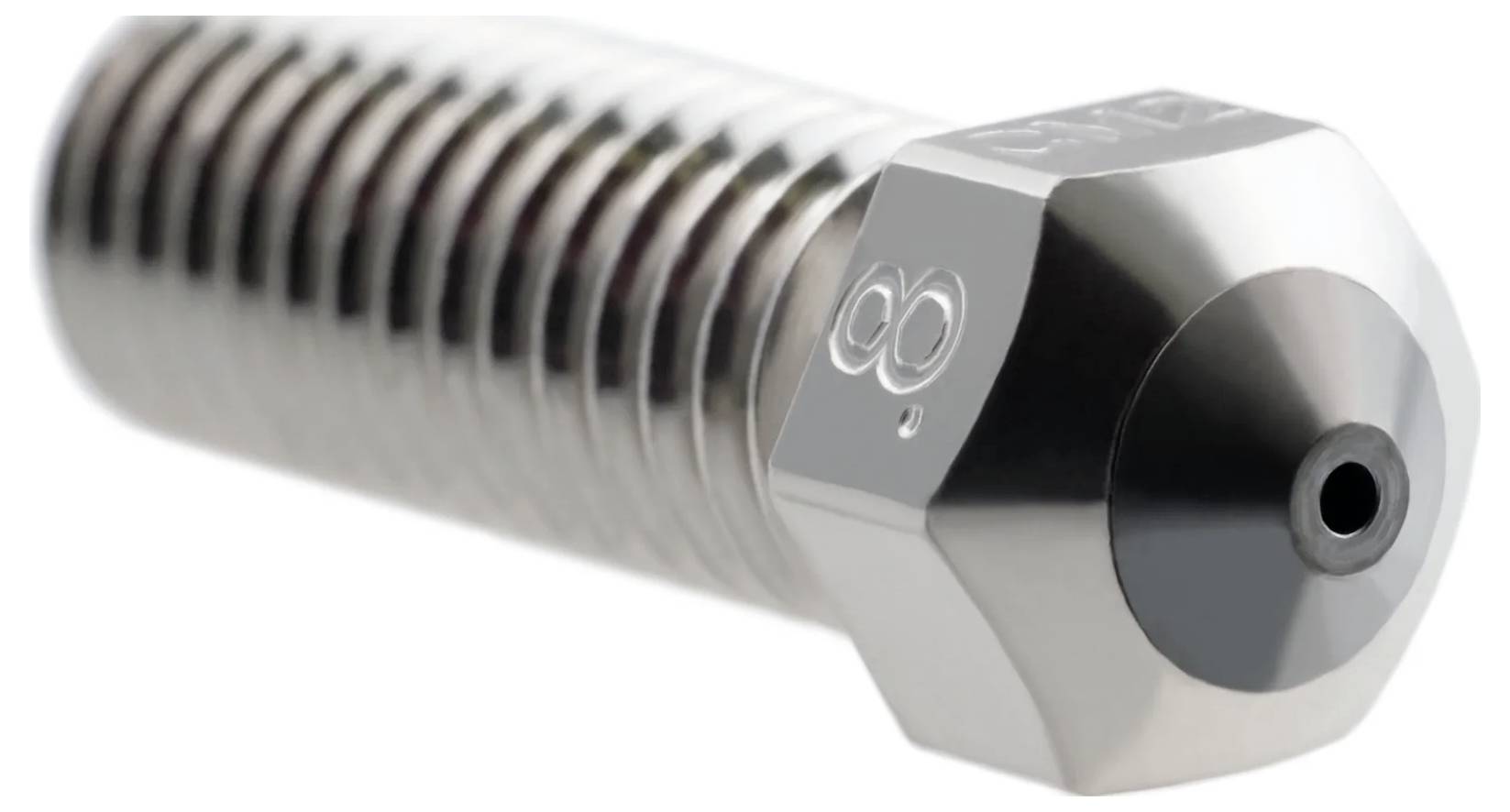Close-up van een metalen nozzle of bout met zeshoekig hoofd en centrale opening, weergegeven op een witte achtergrond.