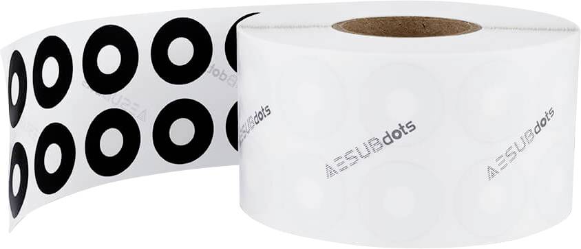 Rol met ronde, zwarte markeringen op een witte achtergrond, geëtiketteerd met 'AESUB dots'.
