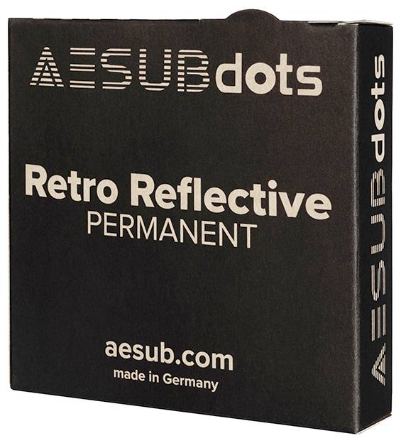 'Zwarte verpakking met witte tekst: AESUB dots, Retro Reflectief Permanent. Website aesub.com, gefabriceerd in Duitsland.'