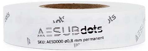 Een witte rol kleefpunten met de opdruk 'AESUBdots SKU: AESD000 Ø0,8 mm permanent'.