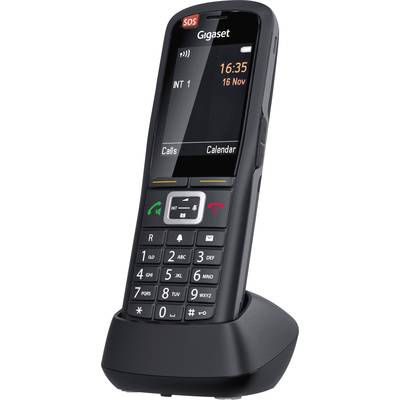 Zwart draadloos telefoon op laadstation toont datum en tijd op display. Toetsen voor oproep, agenda en SOS-functie zijn zichtbaar.