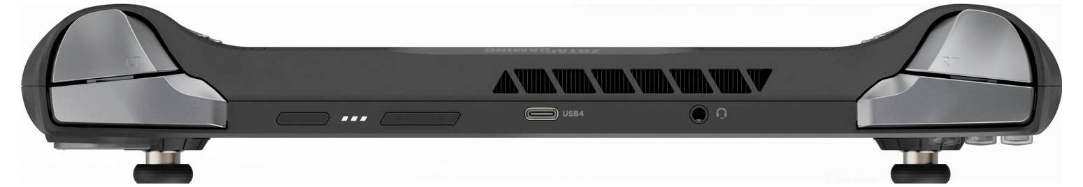 Draagbare gameconsole, zwart, gefotografeerd van achteren. Verluchtingssleuven en aansluitingen voor koptelefoon en USB zijn zichtbaar, staand op een standaard.