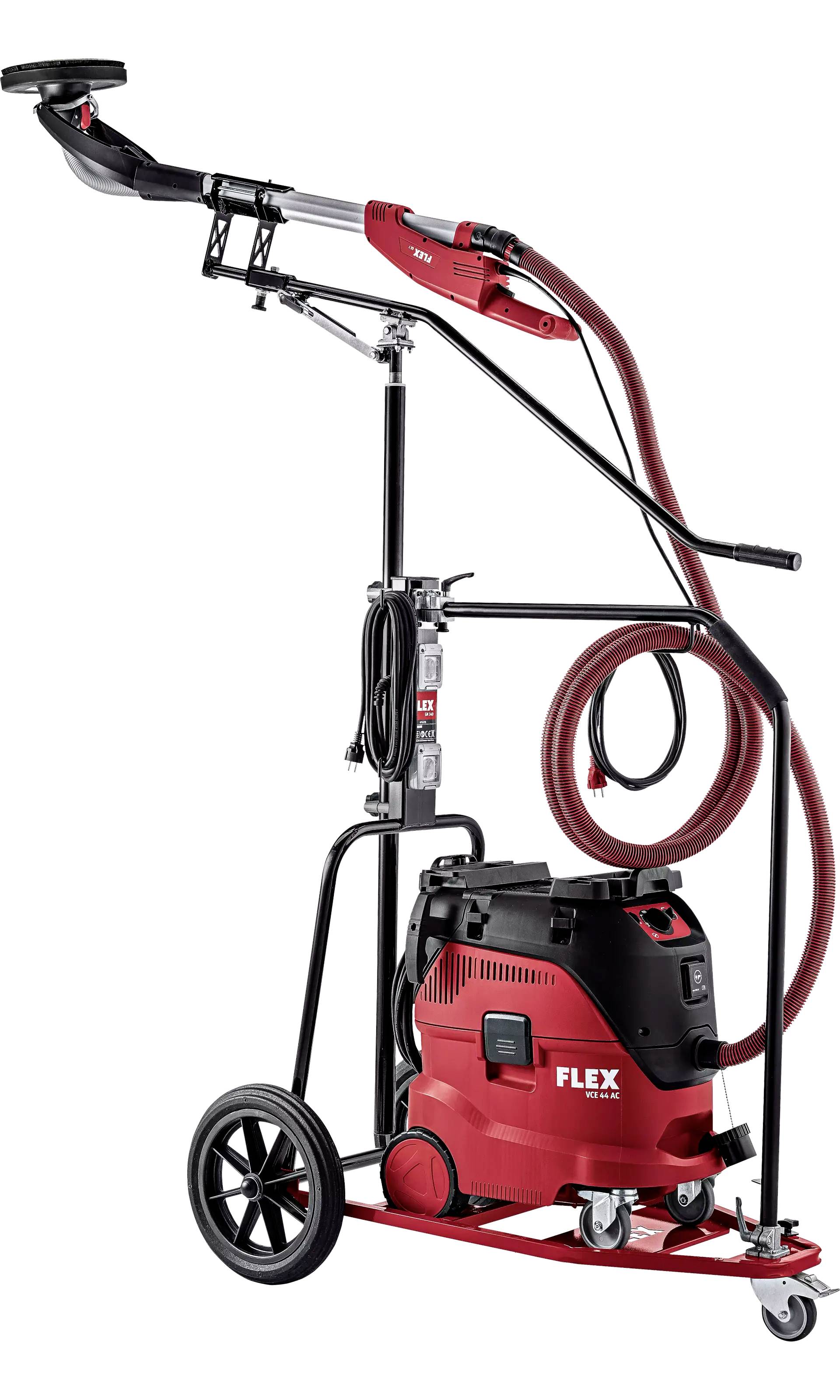 Rood slijpsysteem op wielen met stofzuiger en lange slangen, geschikt voor grote oppervlakken bij bouw- of renovatieprojecten.