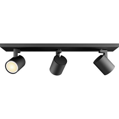 Drievoudige zwarte plafondspot met moderne, minimalistische uitvoering; één lamp is ingeschakeld en straalt warmte uit.