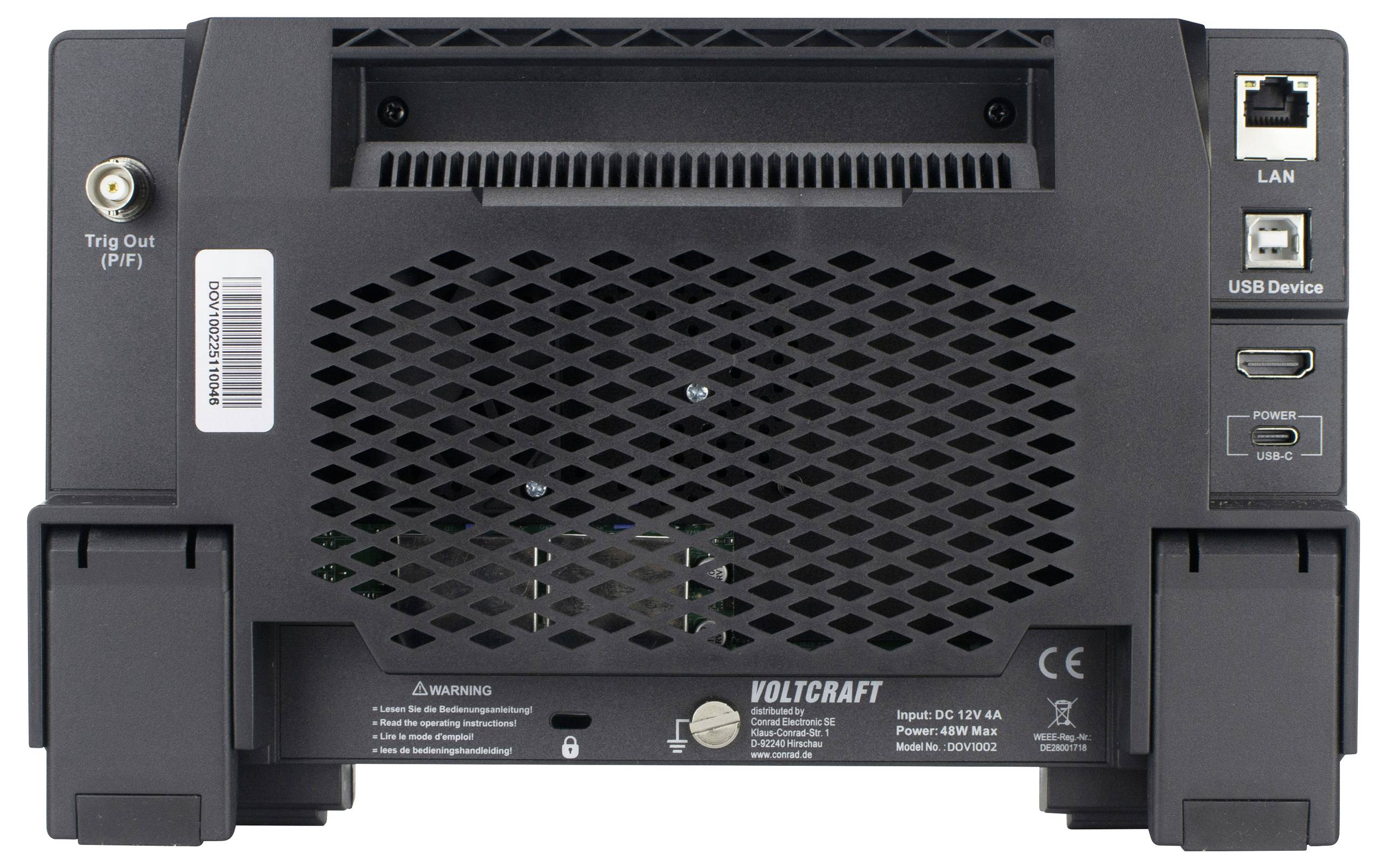Achterkant van een technisch apparaat met LAN- en USB-poorten, stroomaansluiting en ventilatieroosters. Merknaam 'VOLTCRAFT' zichtbaar.