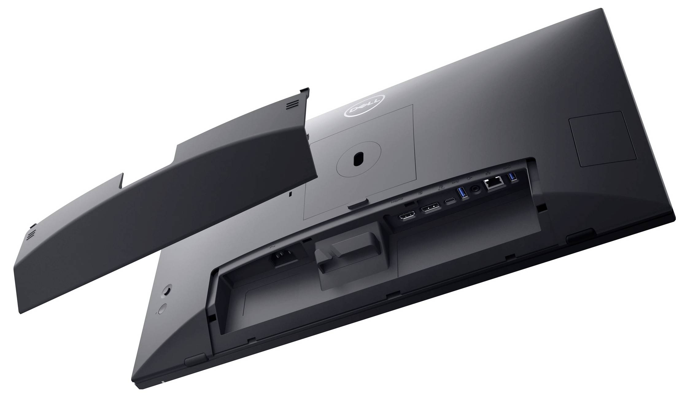 Achterkant van een computerbeeldscherm met een verwijderbaar afdekstuk dat aansluitpoorten zoals HDMI en USB zichtbaar maakt.