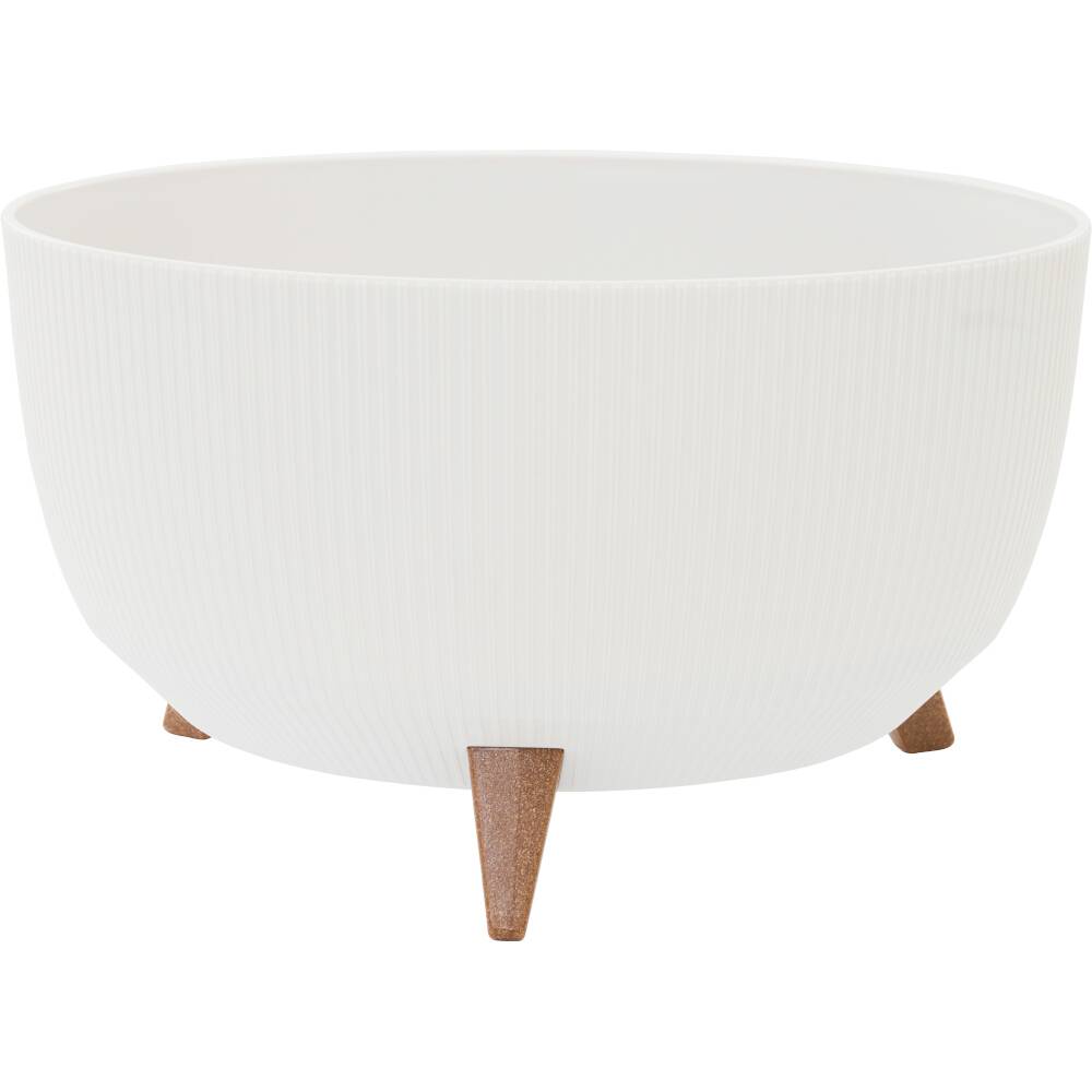 Witte, geribde kom op drie korte, slanke houten poten, minimalistisch en modern vormgegeven.