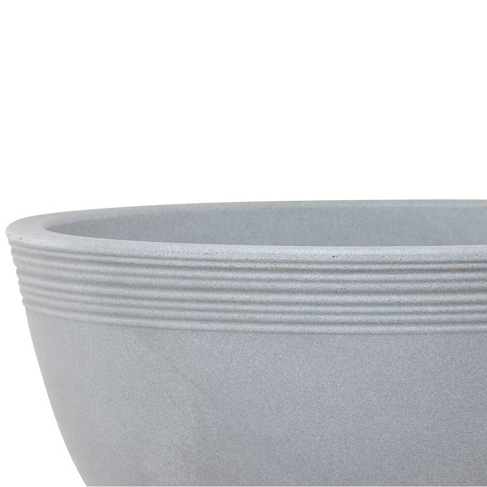 Grijze, ronde, gegroefde schaal van steen.