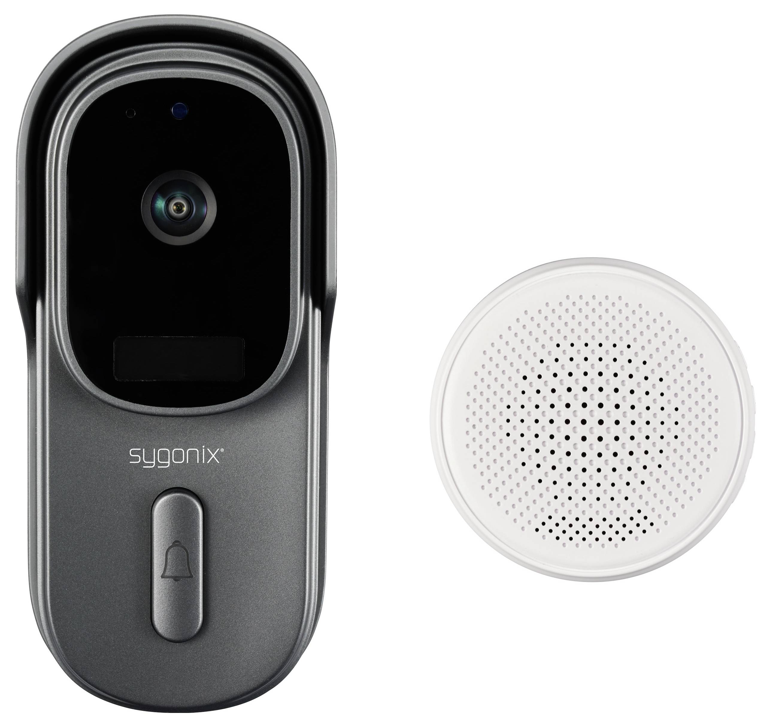 Zwarte Sygonix videodeurbel naast witte luidspreker. De deurbel heeft een camera en een belknop met een klokjesymbool.
