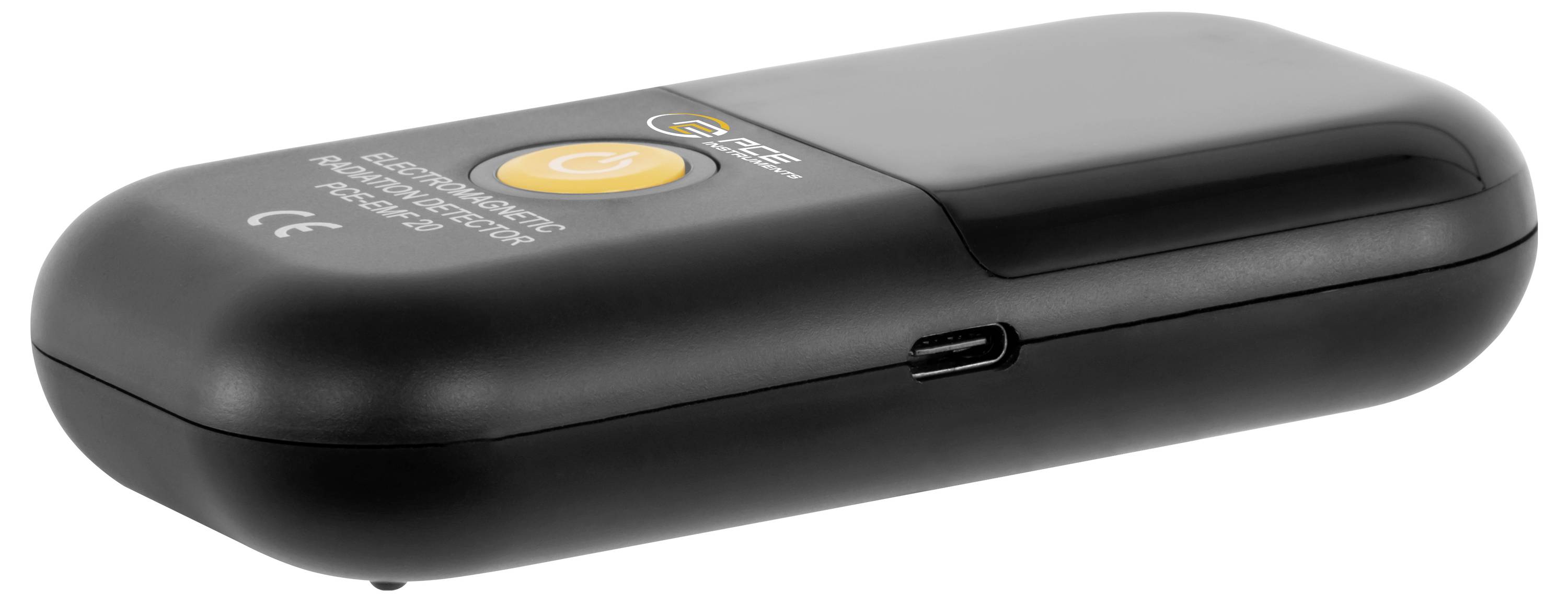 Zwart draagbaar elektronisch apparaat met een grote oranje aan/uit-knop en een USB-C-poort aan de zijkant, weergegeven in profielweergave op een witte achtergrond.