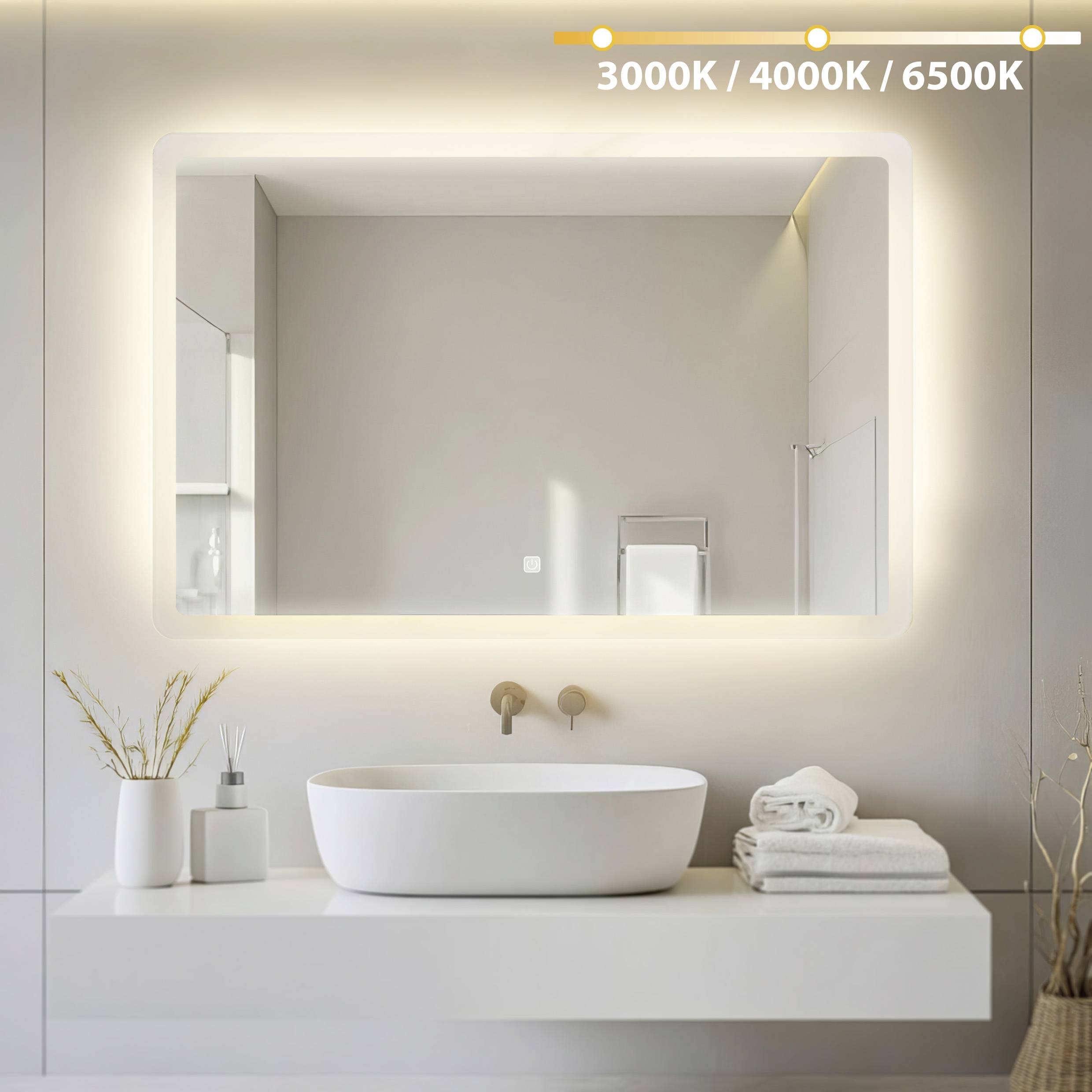 Verlichte badkamerspiegel met kleurtemperaturen van 3000K, 4000K, 6500K; modern design, wastafel en handdoeken eronder.