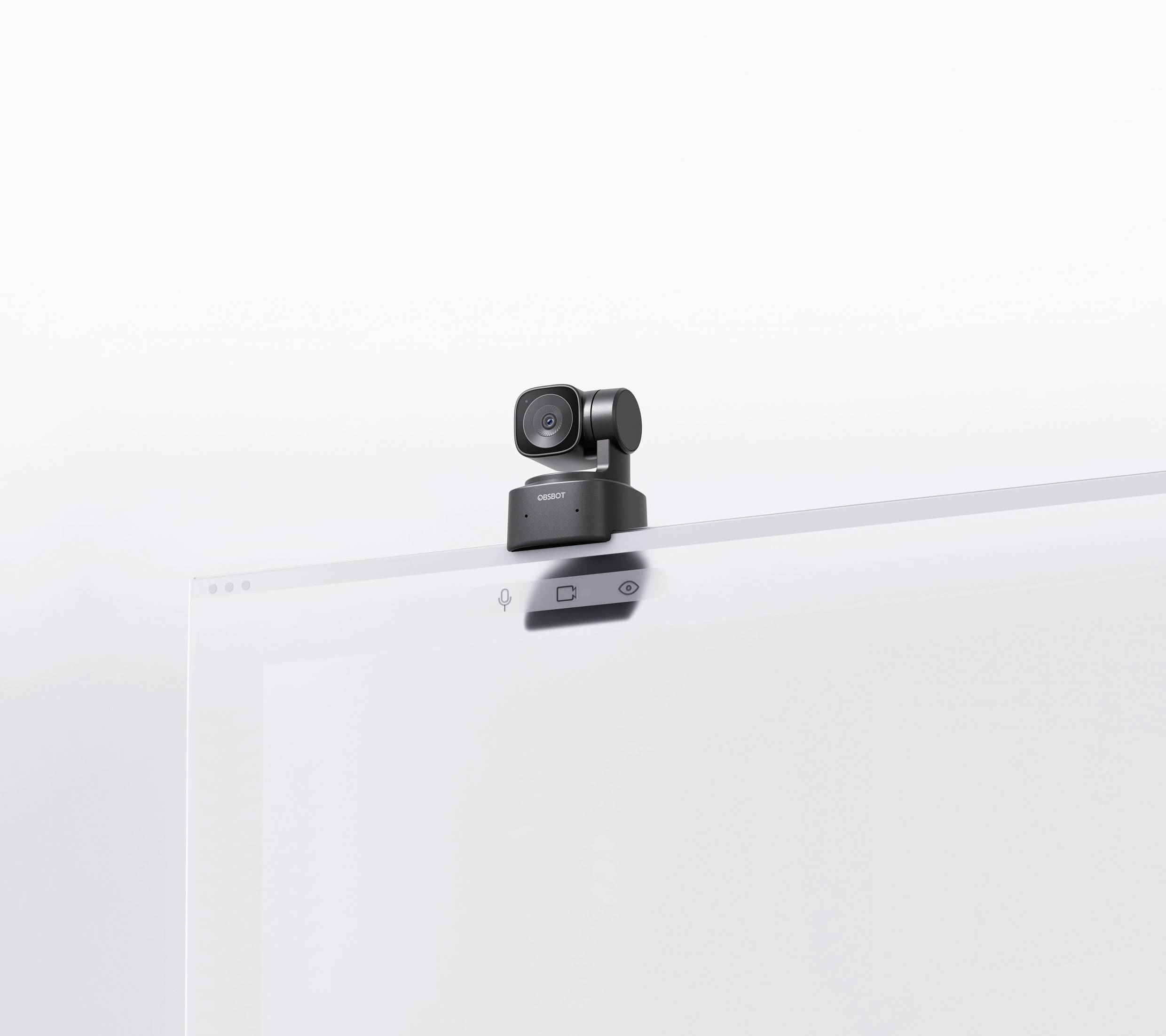 Webcam gemonteerd op een beeldscherm, klaar voor video-oproepen of vergaderingen. Minimalistisch design en moderne technologie.