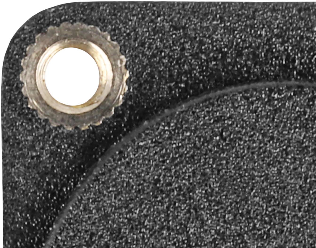 Close-up van een gestructureerd, zwart oppervlak met een zilveren metalen schroef in de hoek.