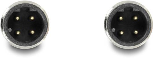 Twee ronde zwarte stekkers met drie gouden pinnen, symmetrisch gerangschikt, op een witte achtergrond.