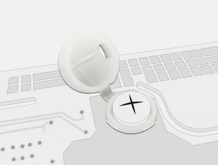 Een geopende plastic behuizing op een technische printplaat met printsporen en aansluitingen, mogelijk onderdeel van een elektronisch apparaat.