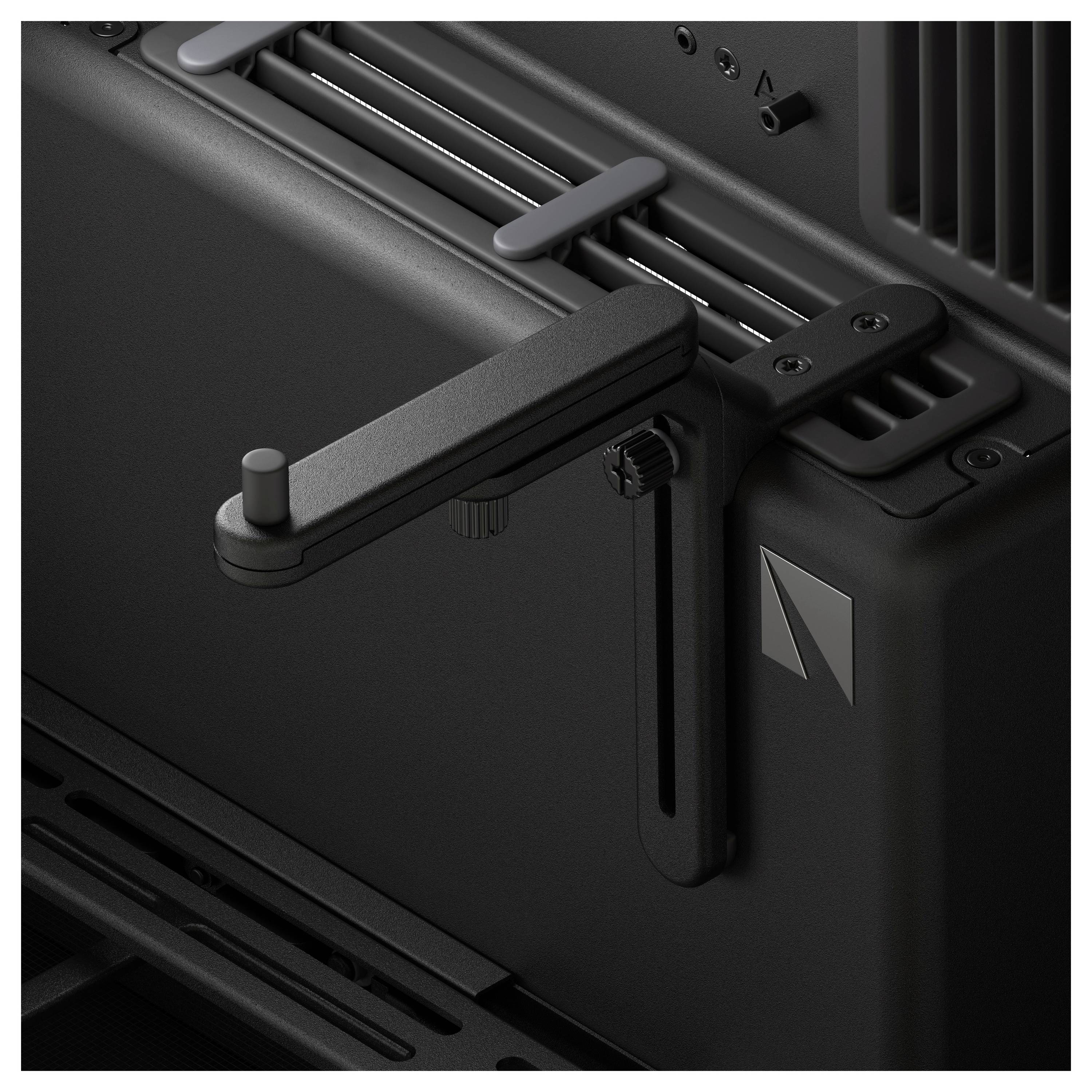 Een zwart technisch apparaat met een verstelbare hefboom, gemonteerd op een metalen frame. Het apparaat lijkt industrieel van aard.