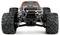 'Close-up van een bestuurbare monstertruck met grote, robuuste banden en een sportief, kleurrijk design.'