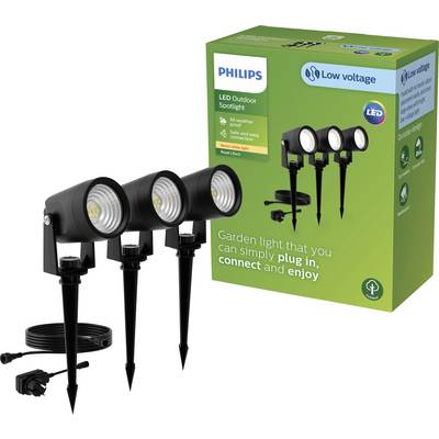 Drie Philips LED-buitenspots met grondpennen voor een groene verpakking, productbeschrijving benadrukt eenvoudige installatie in de tuin.