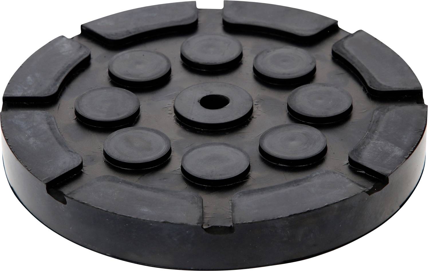 Ronde, zwarte rubberen schijf met meerdere verhoogde rubberen nokjes aan de bovenkant. Geschikt als rubberen onderlegger of beschermend element.